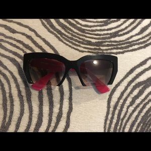 Miu Miu Rasoir sun glasses.